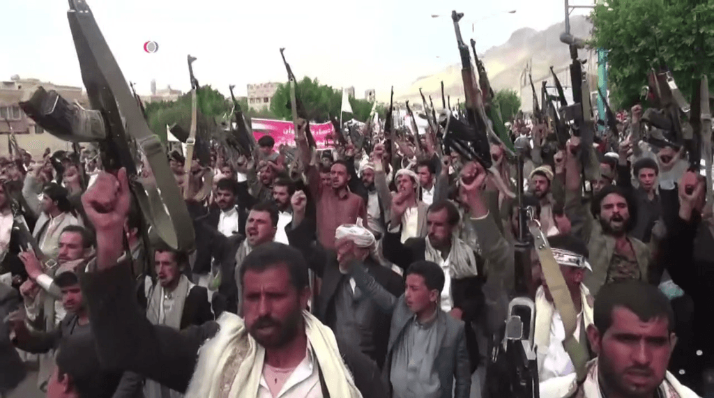 Houthis protest against airstrikes by the Saudi-led coalition on Sana'a in September 2015.