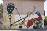 Mural représentant une personne transpercée par une flèche tirée d’une tour de garde noire