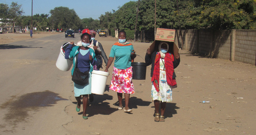Women wearing face masks in Zimbabwe June 2020. Copyright: Shutterstock