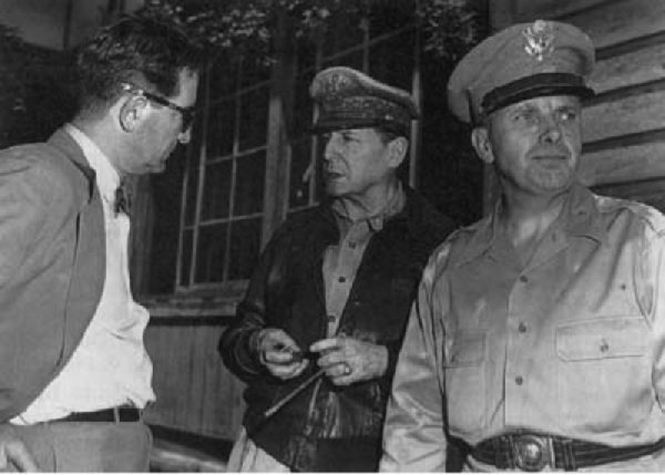 General MacArthur discusses the military situation with Ambassador John J. Muccio at ROK Army headquarters, 29 June 1950. (National Archives):
