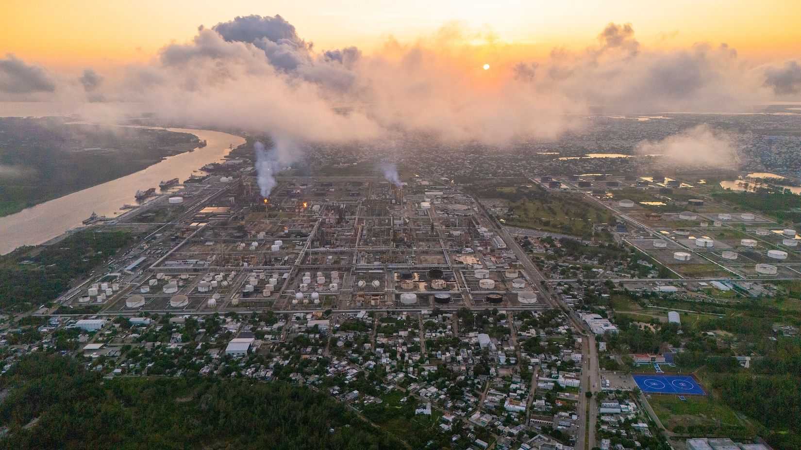 Aerial view of the port city of Tampico Tamaulipas, Mexico. You can see the Panuco River flowing past the city's distinctive refinery.