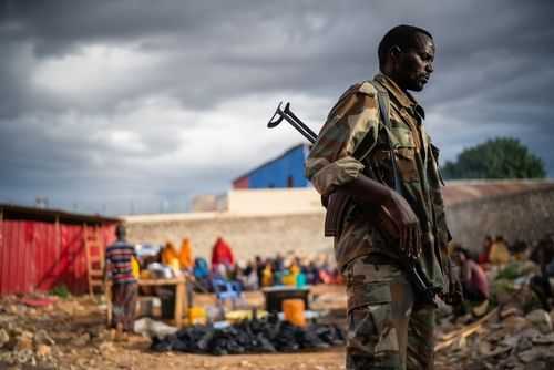 A soldier stands guard at a makeshift camp in Somalia’s Baidoa, a southwestern town frequently attacked by Al-Shabaab militants.