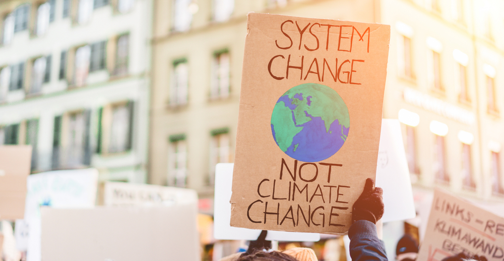 System Change Not Planet Change. Copyright: Shutterstock System Change Not Planet Change