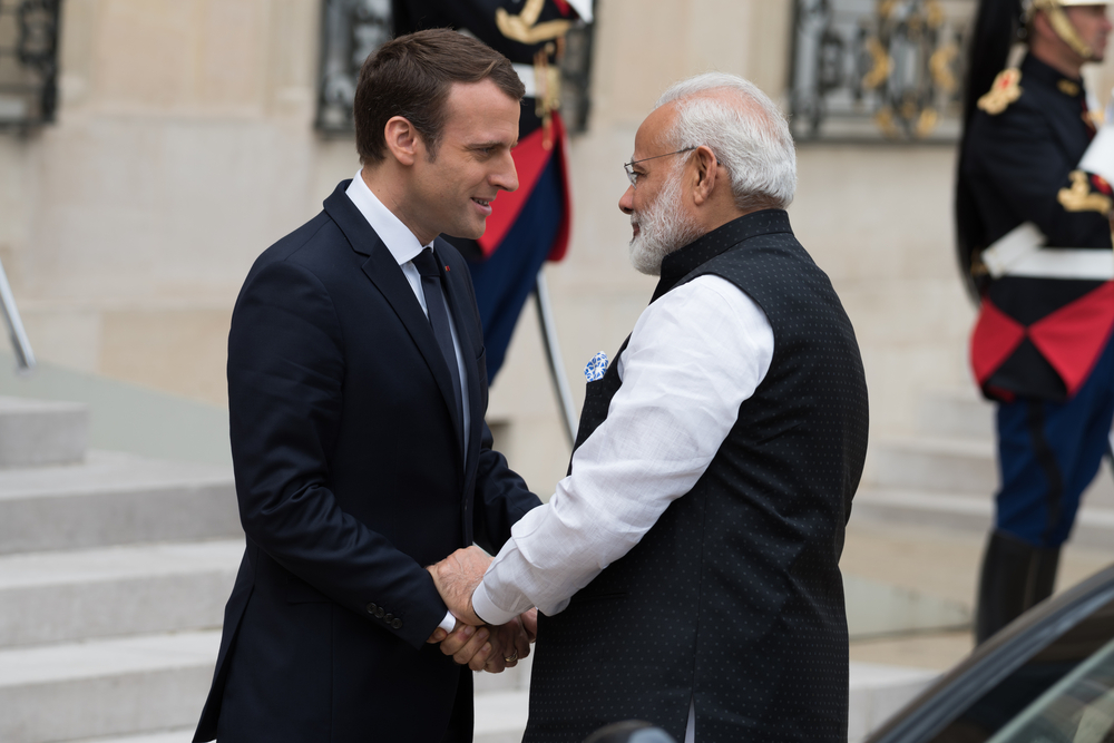 French President Emmanuel Macron receives Indian Prime Minister Narendra Modi