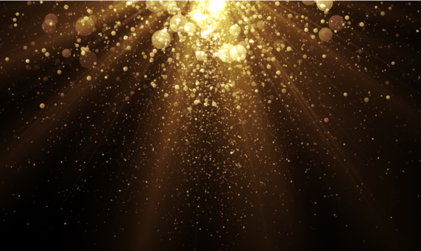 Festive background with gold particles falling from above