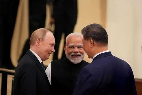 Indian Prime Minister Narendra Modi speaks with Russian President Vladimir Putin and Chinese President Xi Jinping ahead of the 2025 SCO summit at the Meijiang Convention Center in Tianjin, China, on September 1, 2025