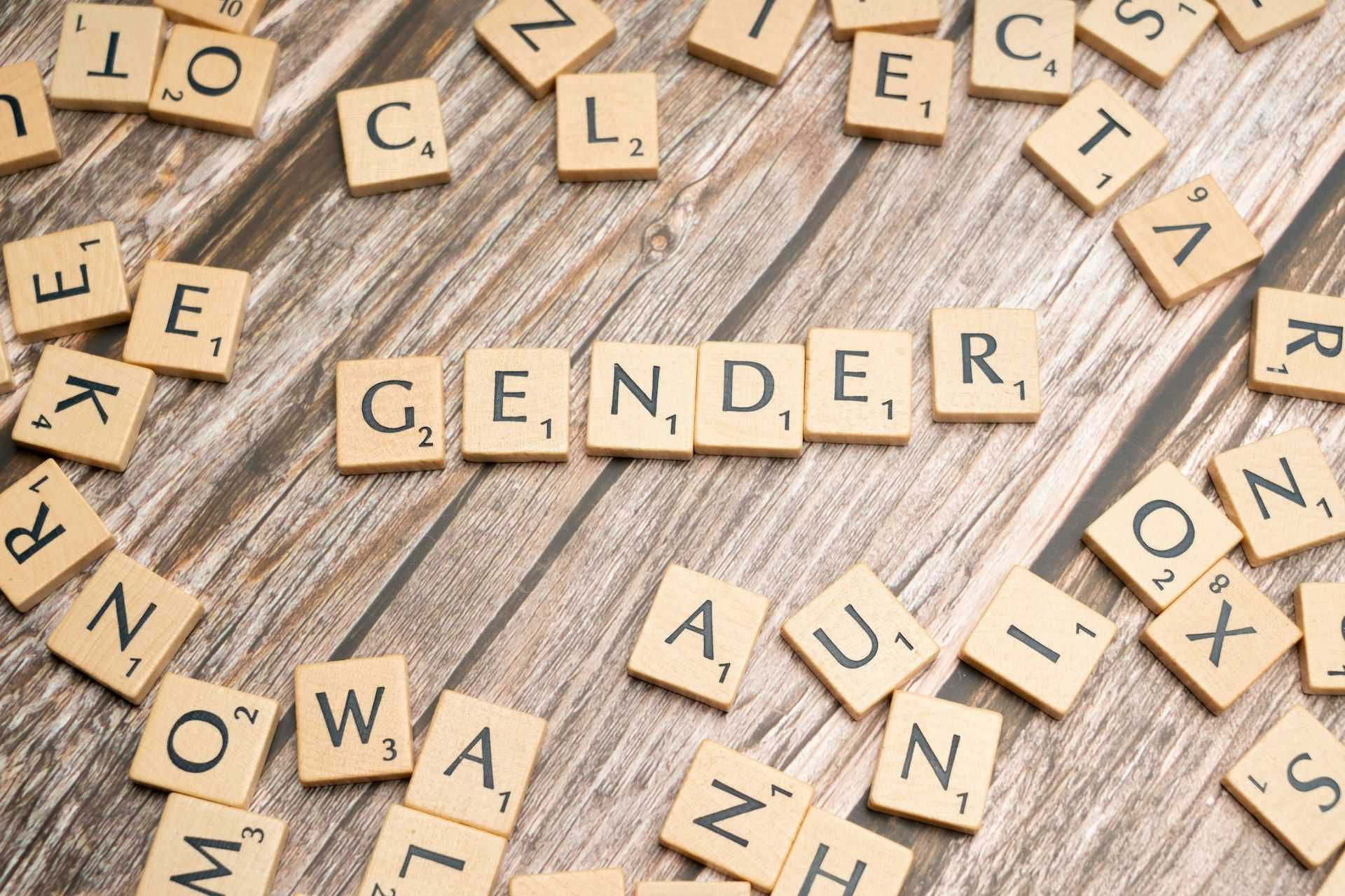 Scrabble tiles spelling the word 'gender'
