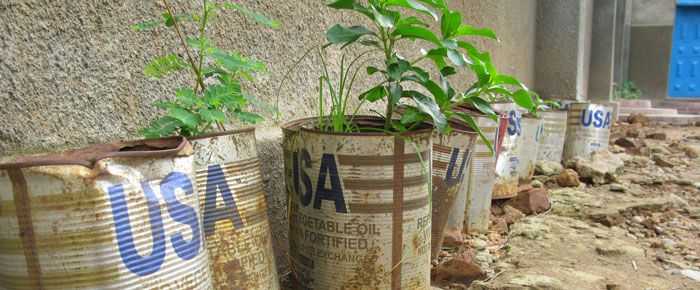 Wau, South Sudan - August 2012: Usaid cans in Wau