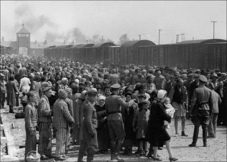 "Selection" of Hungarian Jews on the ramp at the death camp Auschwitz-II (Birkenau) in Poland during German occupation, May/June 1944. Jews were sent either to work or to the gas chamber. The photograph is part of the collection known as the Auschwitz Album. See Auschwitz Album, Yad Vashem: "The Auschwitz Album is the only surviving visual evidence of the process leading to mass murder at Auschwitz-Birkenau."