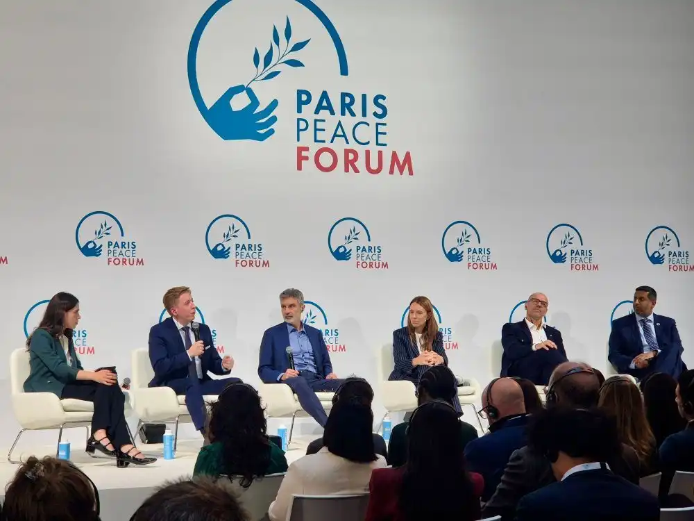 Stage A at the Paris Peace Forum, a panel with Jacinda Arden.