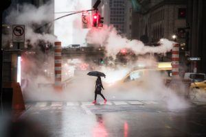 A woman with an umbrella Credit image : shutterstock