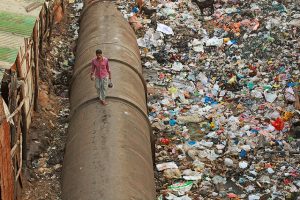 The journey to from market to home for a resident of the Dharavi slum.. by Meena Kadri. Flickr CC BY-NC-ND 2.0