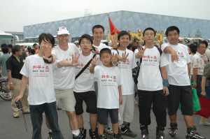 Climate Change Agents outside the Watercube, Beijing China. by Philip McMaster, via Flickr. CC BY-NC 2.0