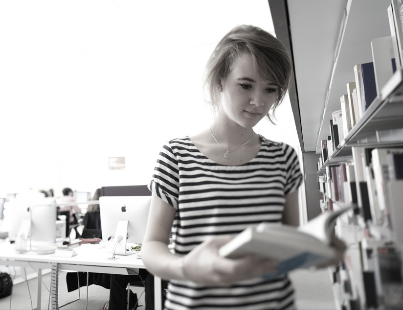 a young student in the library